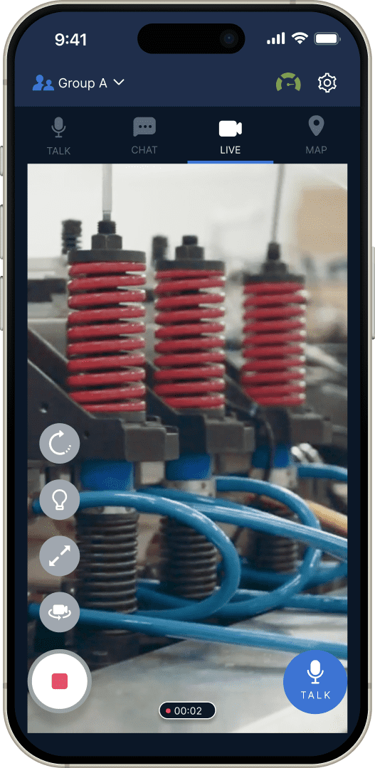 赤いスプリングと青い配線の機械装置が写っているスマートフォン画面の画像。